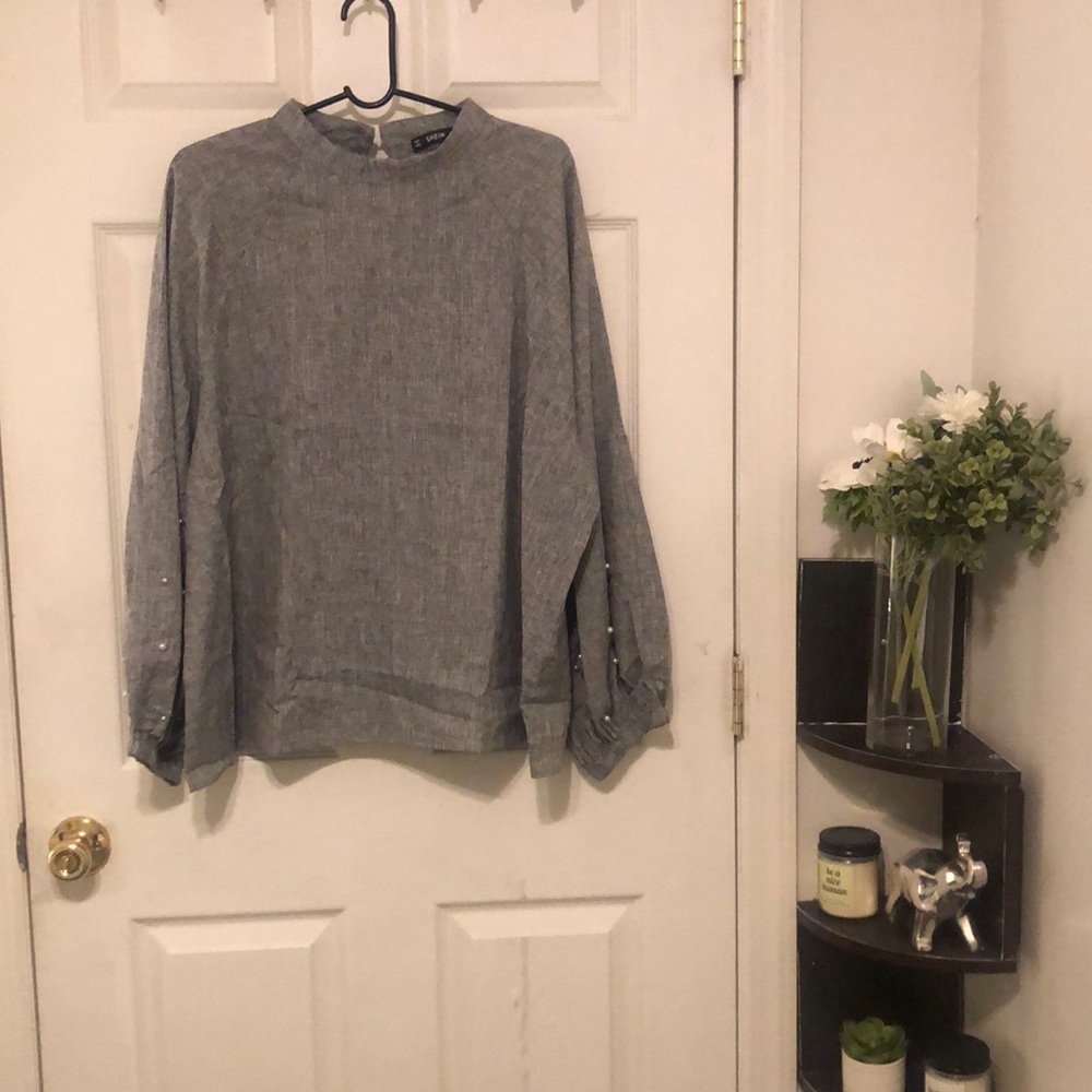 Gray blouse with pearl embellished sleeves